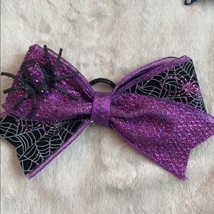 A cheerleading bow🎀